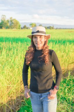 Thai Female with Rice Field Background, Phayao Province.