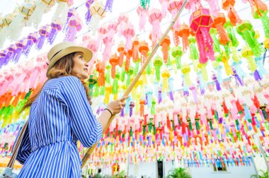 Woman Tourist in Lamphun Lantern Festival, Lamphun Thailand.