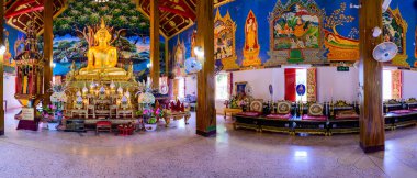 NAN, THAILAND - November 5, 2020 : Panorama View of Old Buddha Statue with Thai Style Church in Prang Temple, Nan Province.