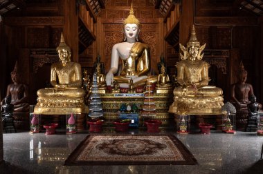 White Buddha statue in Ban Den temple, Chiang Mai province.