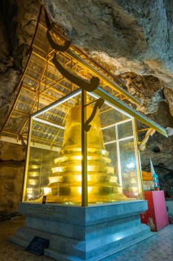 Phra Sabai cave with golden pagoda in Lampang province, Thailand.