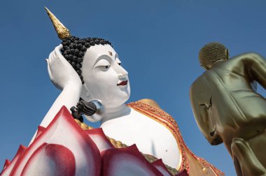 Reclining Buddha statue of Phra That Doi Kham temple, Chiang Mai province.
