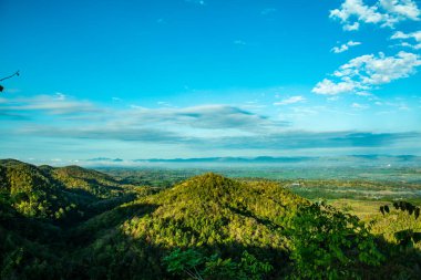 Mountain view with native village in Phrae province, Thailand.