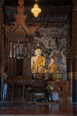 Beautiful Buddha with ancient wall painting in Rong Ngae temple, Thailand.