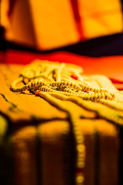 stock image Lanna Style Ancient Beads on Old Cloth, Chiang Mai Province.