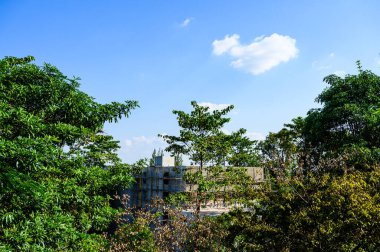 Blue sky and building under construction, Chiang Mai Province.