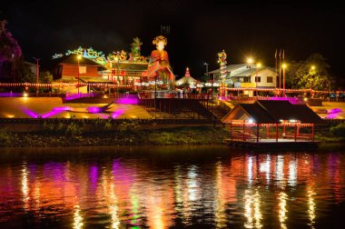 Nakhon Sawan, Thailand - January 31, 2023 : Chao Mae Tubtim Shrine at the origin of the Chao Phraya River at night in Nakhon Sawan Province. clipart