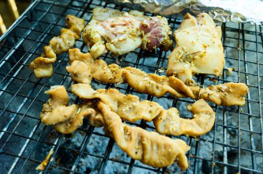 Thai style meat grilling in country, Thailand.