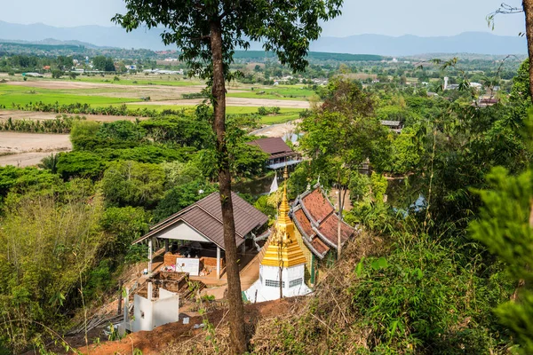 stock image Buddhism building with rice field in Chiang Rai province, Thailand.