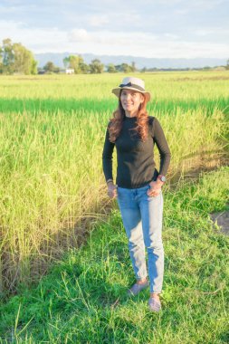 Thai Female with Rice Field Background, Phayao Province.