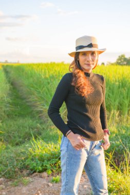Thai Female with Rice Field Background, Phayao Province.