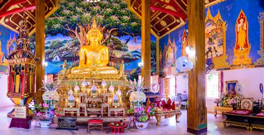 NAN, THAILAND - November 5, 2020 : Panorama View of Old Buddha Statue with Thai Style Church in Prang Temple, Nan Province.