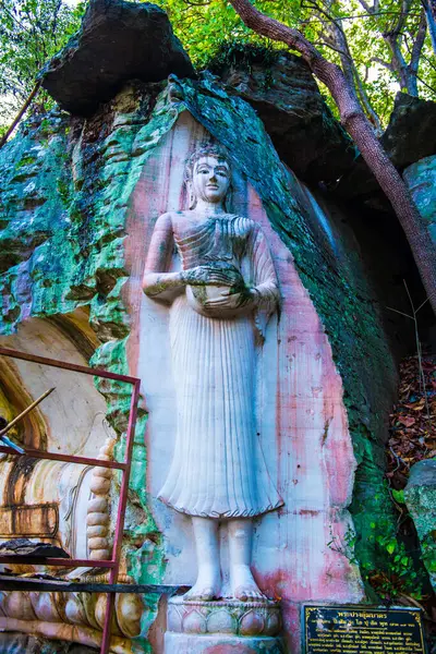 stock image Carving Buddha art on rock in Huai Pha Kiang temple, Thailand.