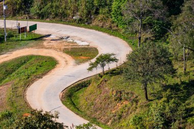 The road is winding and steep at Doi Pha Tang, Chiang Rai Province.