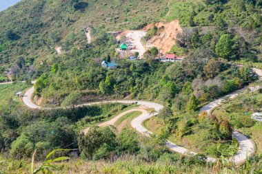 The road is winding and steep at Doi Pha Tang, Chiang Rai Province.