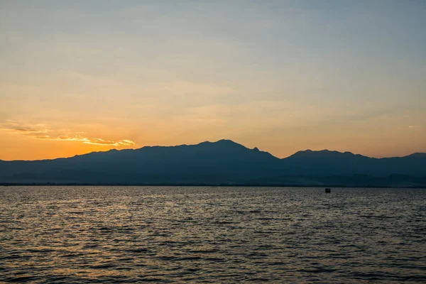 stock image Sunset at Kwan Phayao, Thailand.