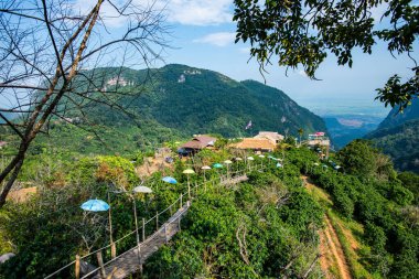 Bamboo bridge with mountain view in Pha Hi village, Chiang Rai province.