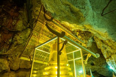 Phra Sabai cave with golden pagoda in Lampang province, Thailand.