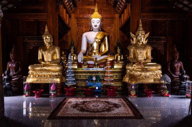White Buddha statue in Ban Den temple, Chiang Mai province.