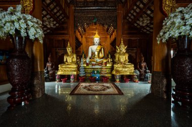 White Buddha statue in Ban Den temple, Chiang Mai province.