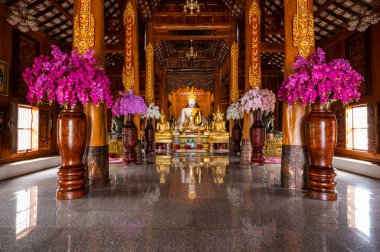 White Buddha statue in Ban Den temple, Chiang Mai province.