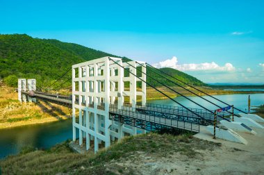 CHIANG MAI, THAILAND - May 27, 2020 : Suspension bridge at Mae Kuang Udom Thara dam, Thailand.