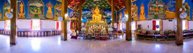 NAN, THAILAND - November 5, 2020 : Panorama View of Old Buddha Statue with Thai Style Church in Prang Temple, Nan Province.