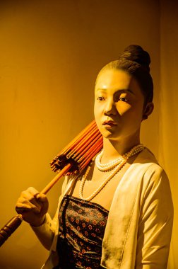 CHIANG MAI, THAILAND - 11 Şubat 2021: Chiang Mai Şehir Sanat ve Kültür Merkezi 'nde Lanna Tarzı Kostüm.