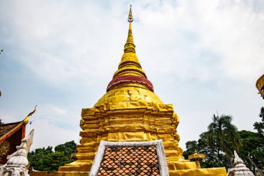 Golden pagoda in Pong Sanuk temple, Lampang province.