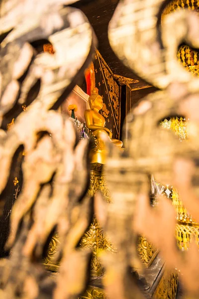 stock image Golden Buddha with Wooden Foreground, Thailand.