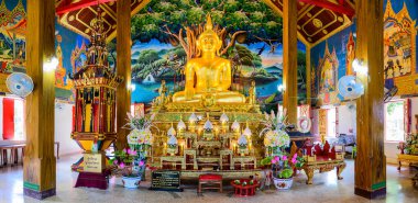 NAN, THAILAND - November 5, 2020 : Panorama View of Old Buddha Statue with Thai Style Church in Prang Temple, Nan Province.