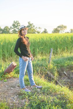 Thai Female with Rice Field Background, Phayao Province.