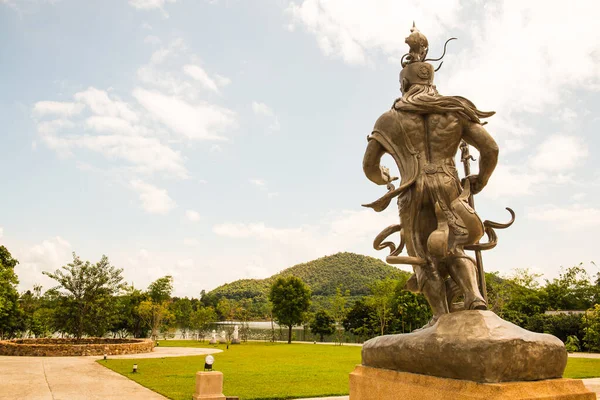 Buddhist statue in front of meditation hall in Chiang Rai province