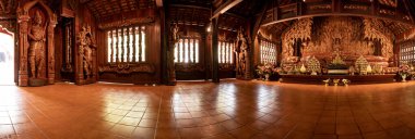 Panorama Image of Reclining Buddha and Beautiful Wooden Building at Wat Luang Khun Win, Chiangmai Province.