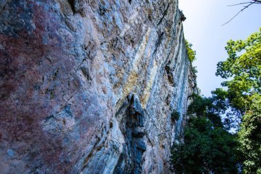 Cliff in tourist attraction of Phratupha rock painting, Lampang province.