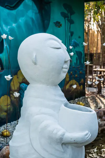 stock image Monk statue in park, Thailand.