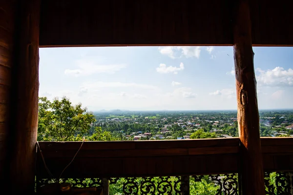 Aerial view of Ban Tham subdistrict from Wat Phrathat Chom Sin viewpoint, Phayao province.