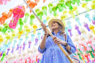 Woman Tourist in Lamphun Lantern Festival, Lamphun Thailand.