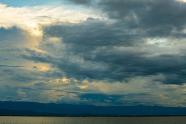 Kwan Phayao lake with rain clouds, Thailand.