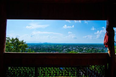 Aerial view of Ban Tham subdistrict from Wat Phrathat Chom Sin viewpoint, Phayao province.