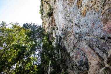 Cliff in tourist attraction of Phratupha rock painting, Lampang province.