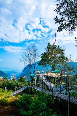 Bamboo bridge with mountain view in Pha Hi village, Chiang Rai province.