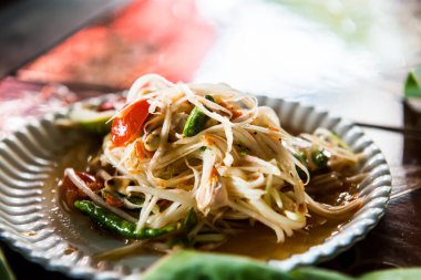 Papaya salatası veya Som Tum, Tayland.