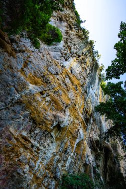 Cliff in tourist attraction of Phratupha rock painting, Lampang province.