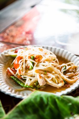 Papaya salatası veya Som Tum, Tayland.