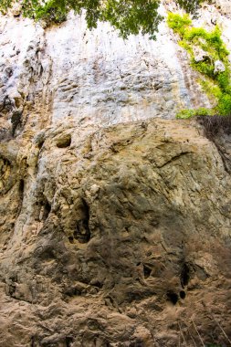 Ancient rock in tourist attraction of Phratupha rock painting, Lampang province.