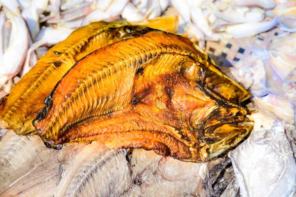 Dried fish smoked with dried coconut shell is an ingredient used in Thai cooking.