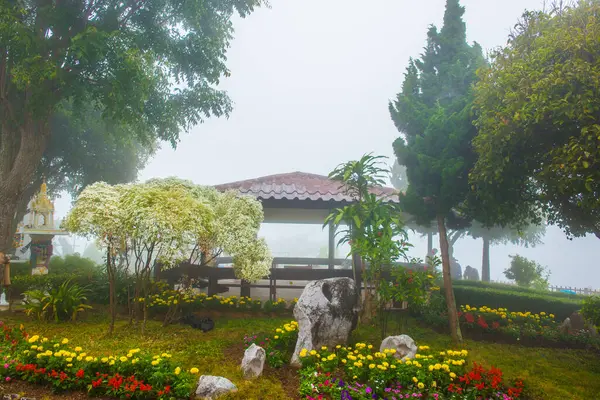 Public rest house with mist in winter season at Phayao province, Thailand.