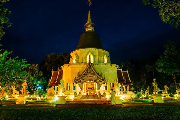 stock image Prabudabath Si Roi Pagoda in Twilight Time at Darabhirom Forest Monastery, Thailand.