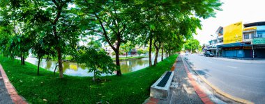 CHIANG MAI, THAILAND - April 26, 2020 : Panorama of Chaeng Si Phum ancient wall with city street, Chiang Mai province.
